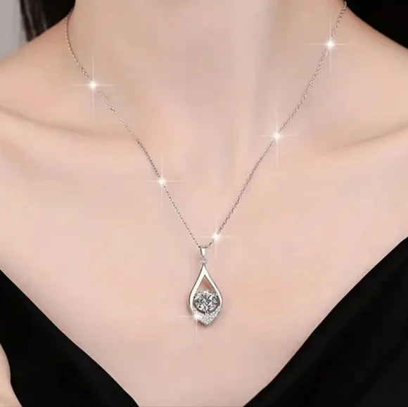 Elegant Sterling Silver Necklace with 
Mojssanite Pendant - Picture 2 of 6